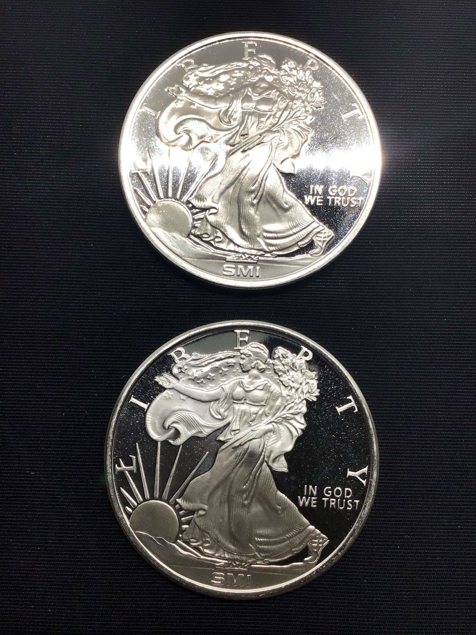 2 each, 1 Troy ounce Silver rounds (1 of 2)