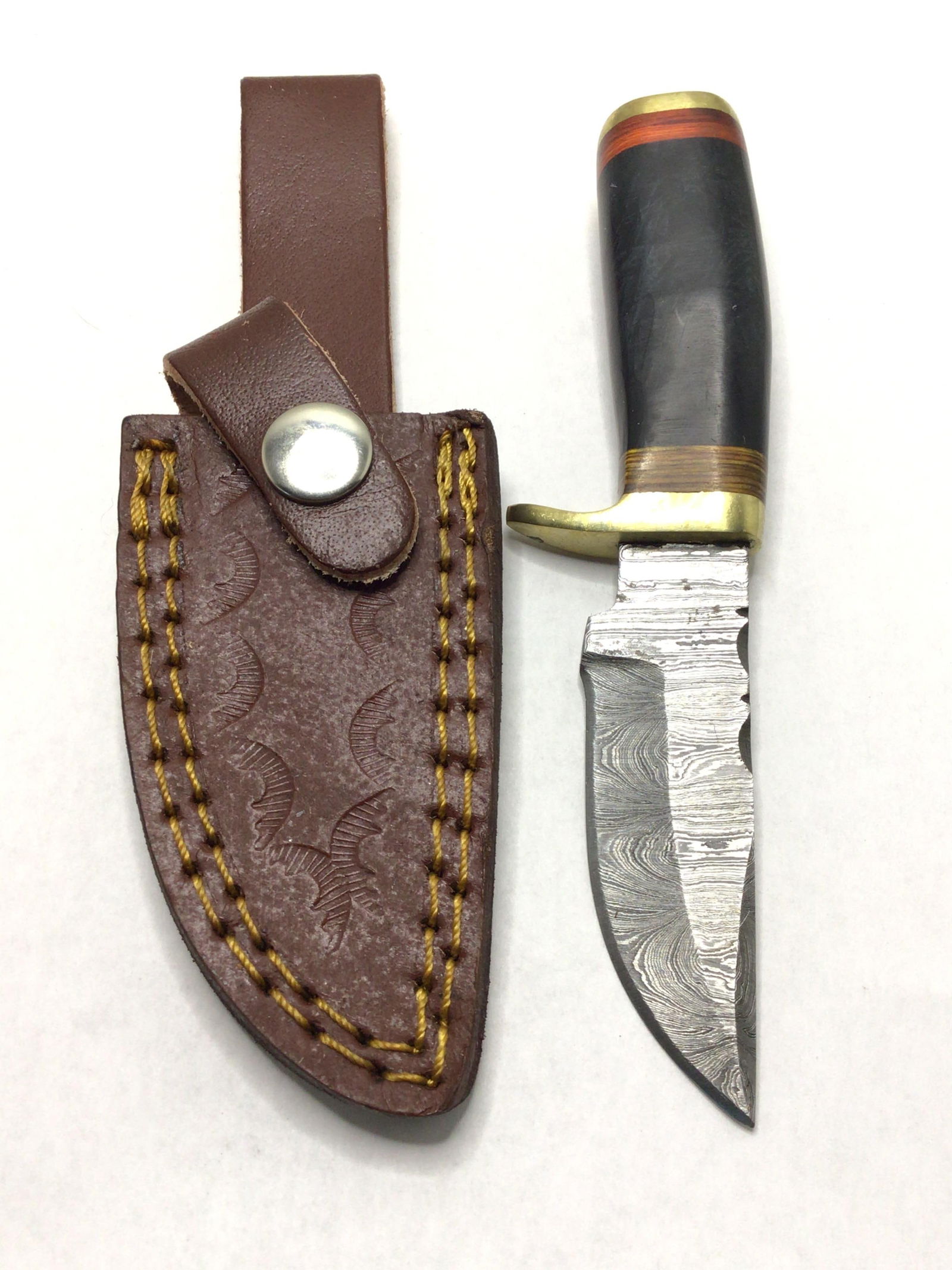 Damascus skinning knife (1 of 3)