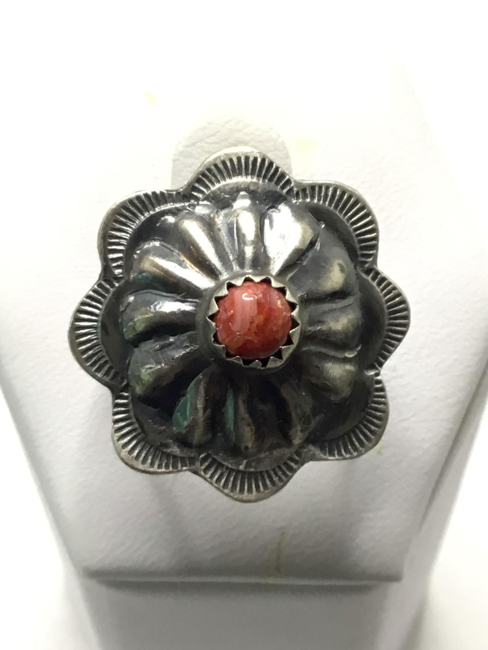 Navajo handmade ring: Navajo handmade sterling silver ring with spiny oyster stone. 2.9 grams total weight. Size 7.5. Made by Tim Yazzie