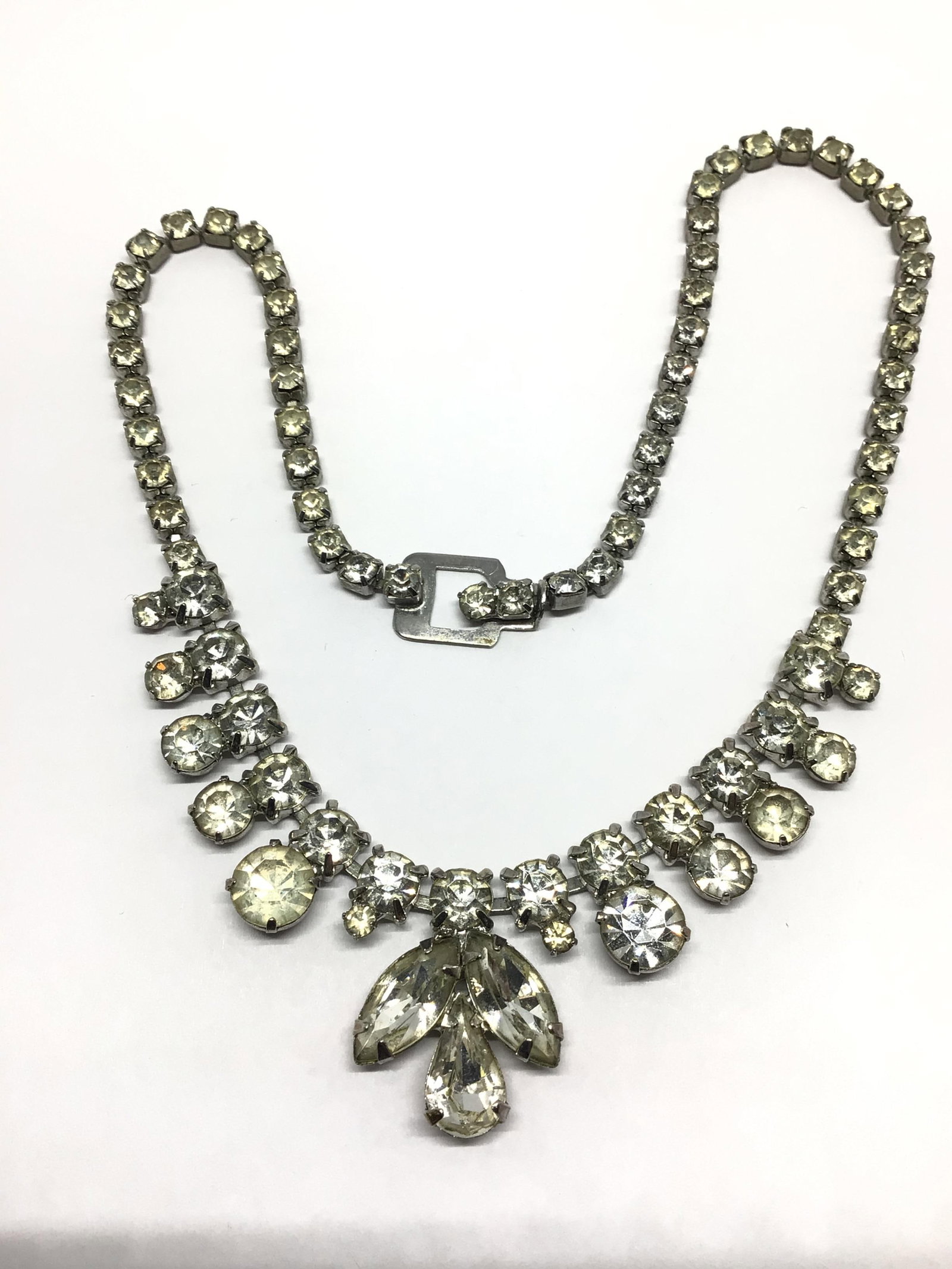 Vintage Weiss Necklace: Vintage necklace with clear gemstones. 24.40 grams total weight. Weiss made.