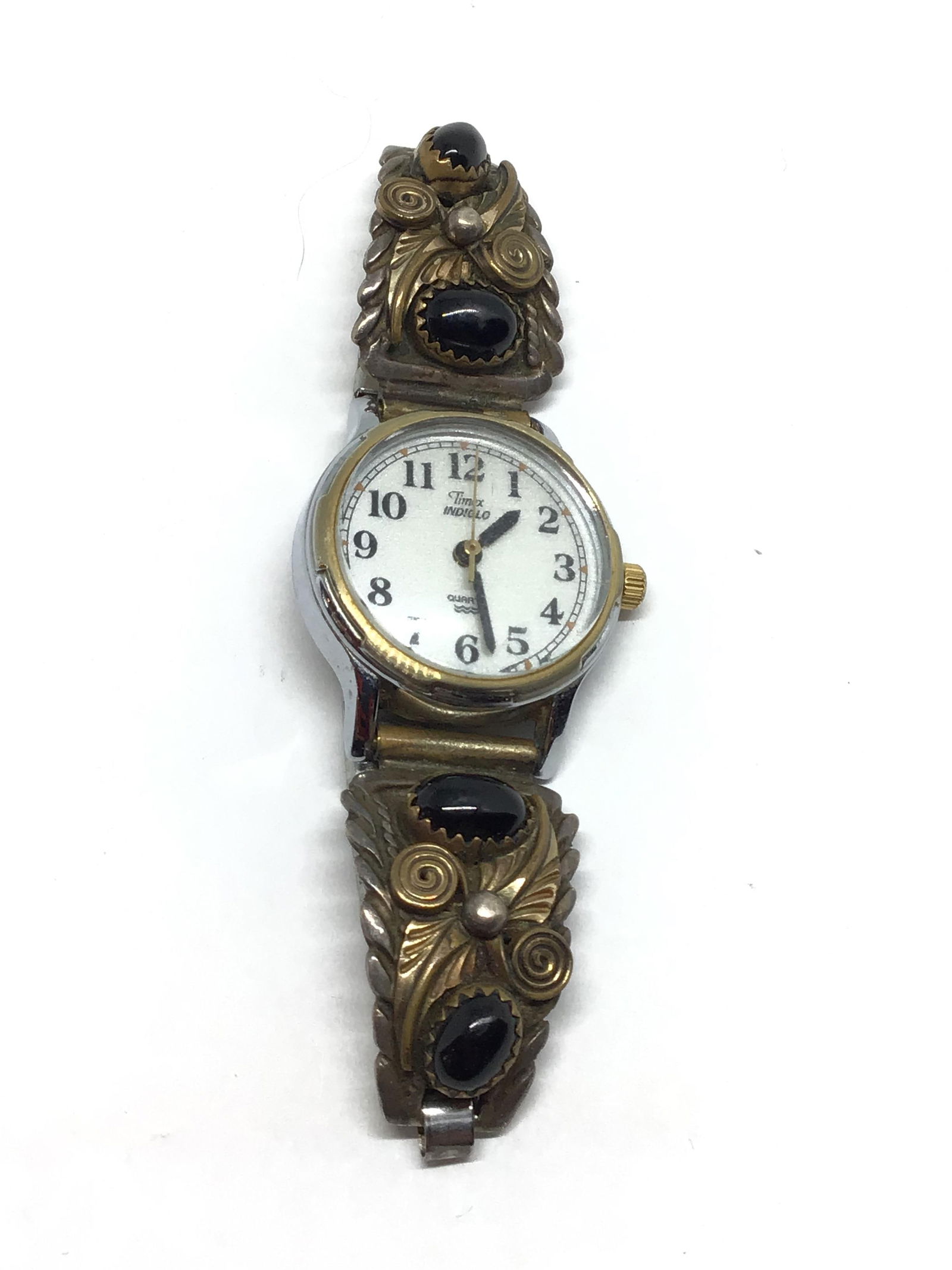 Watch with sterling band: Timex watch with sterling silver band attachment containing onyx stones. Watch not working, may need battery.