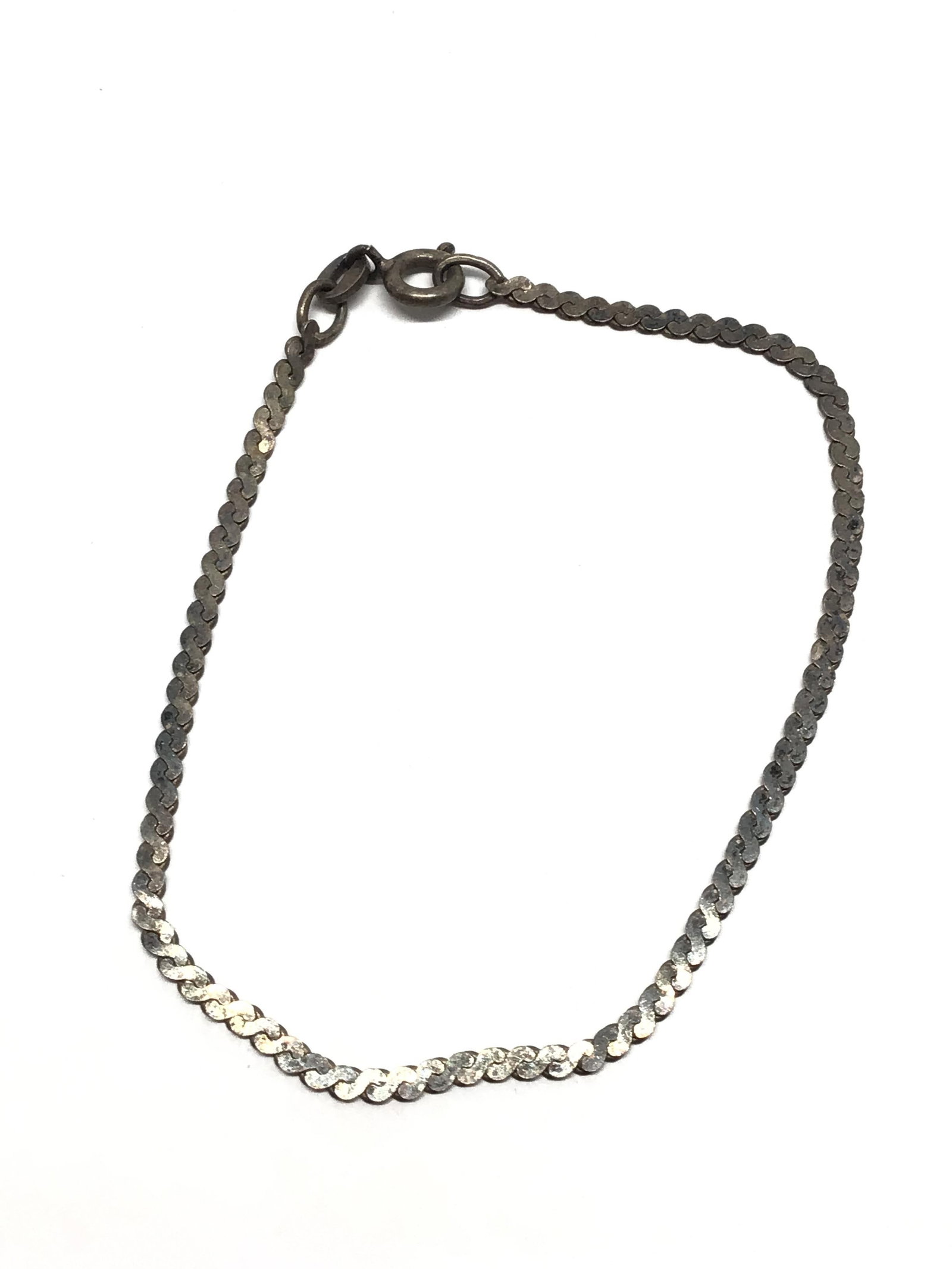 Sterling silver bracelet: Sterling bracelet weighing 2.08 grams. 6.5 inches length.