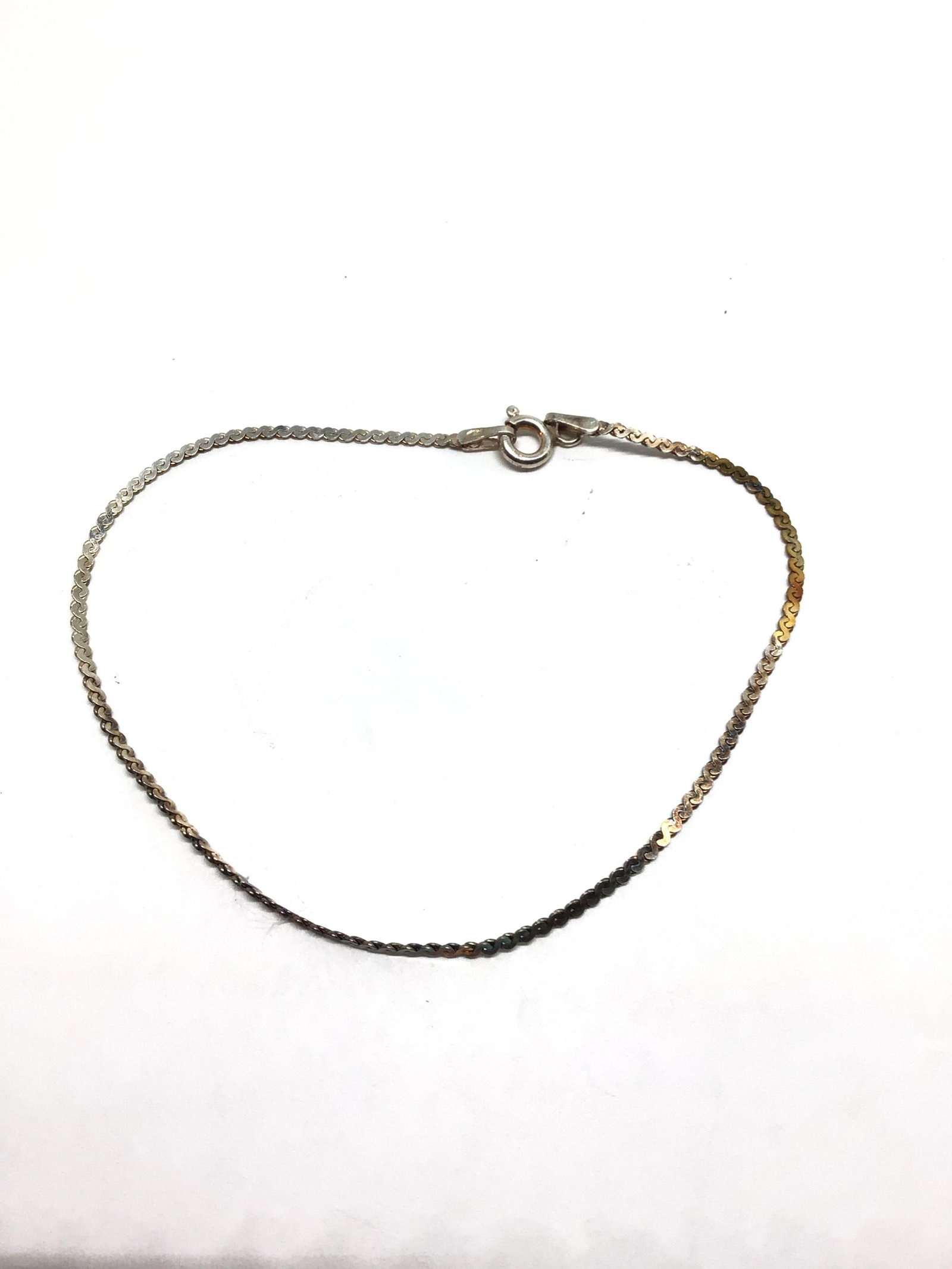 Sterling silver bracelet: Sterling bracelet weighing 1.01 grams. 7 inches length.