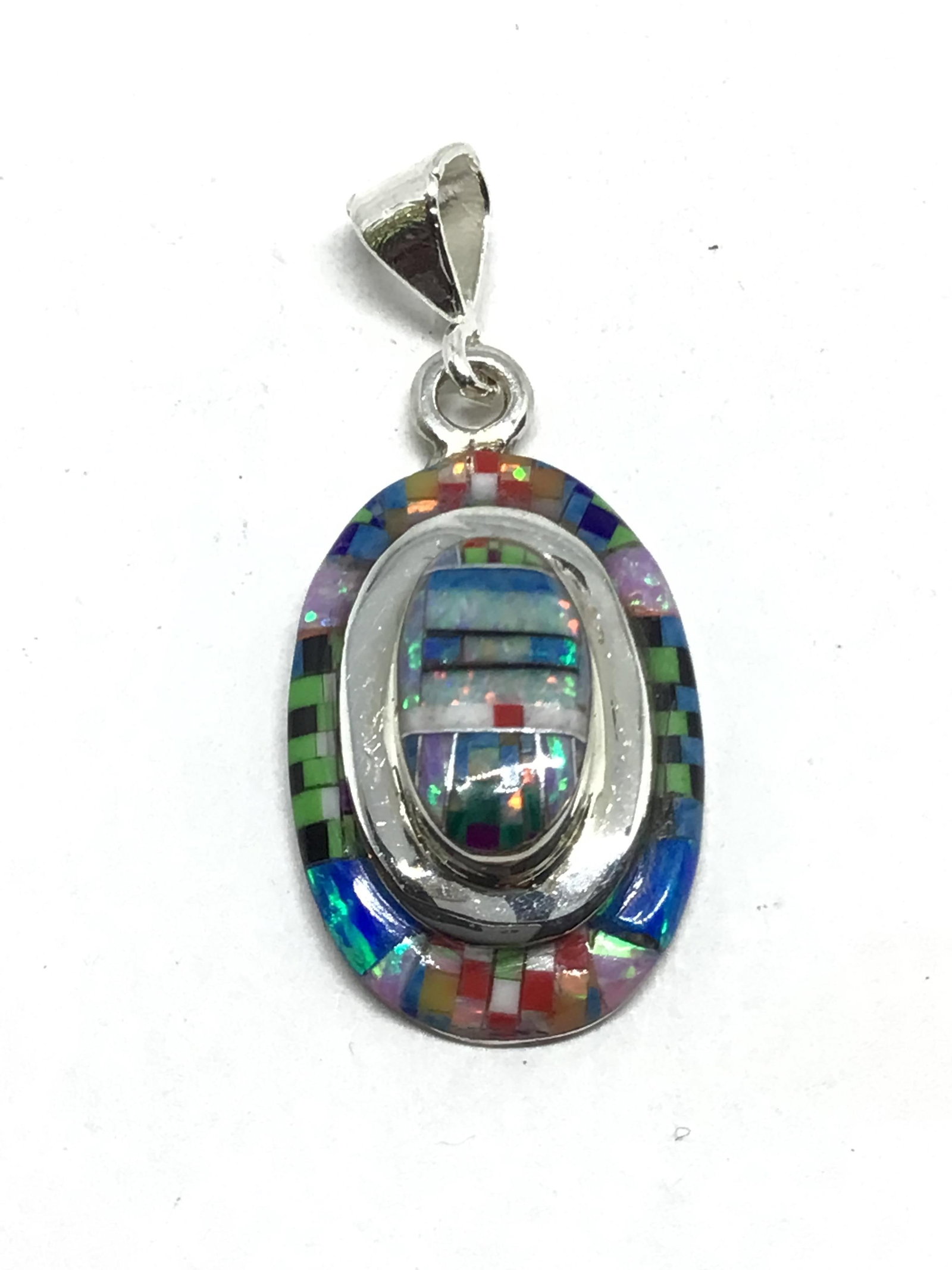Southwest style pendant: Sterling silver 2 stack pendant with multiple stone inlay. 3.03 grams total weight.