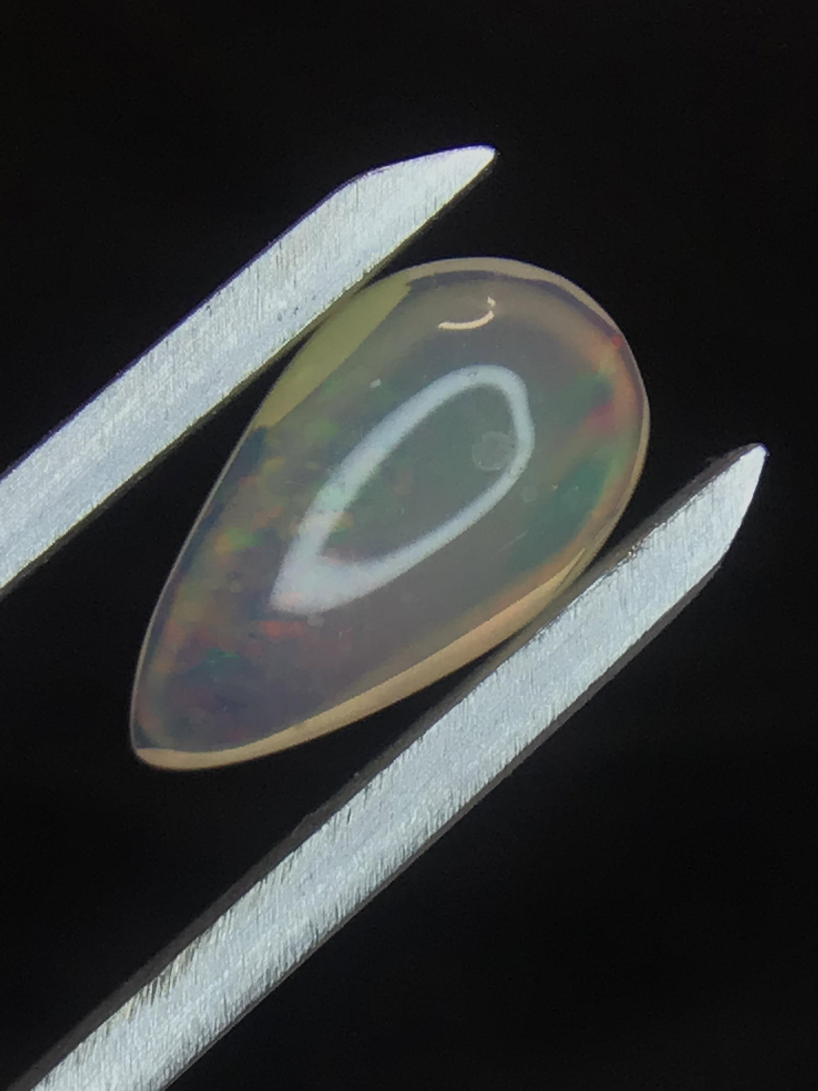 Opal 1.45 ct: Cabochon cut Opal from Ethiopia. 1.45 ct. .29 grams.