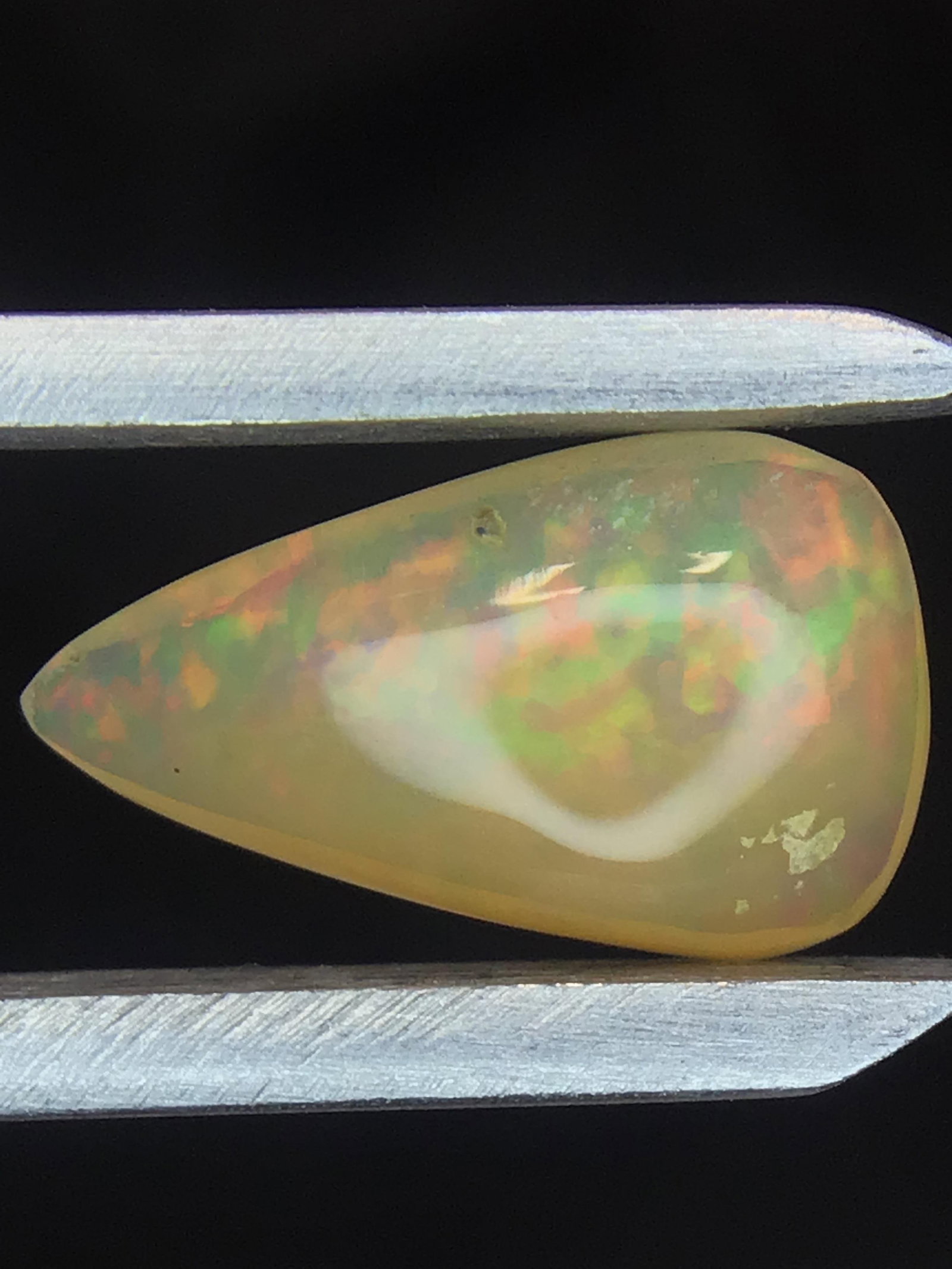 Opal 1.50 ct: Cabochon cut Opal from Ethiopia. 1.50 ct. .30 grams