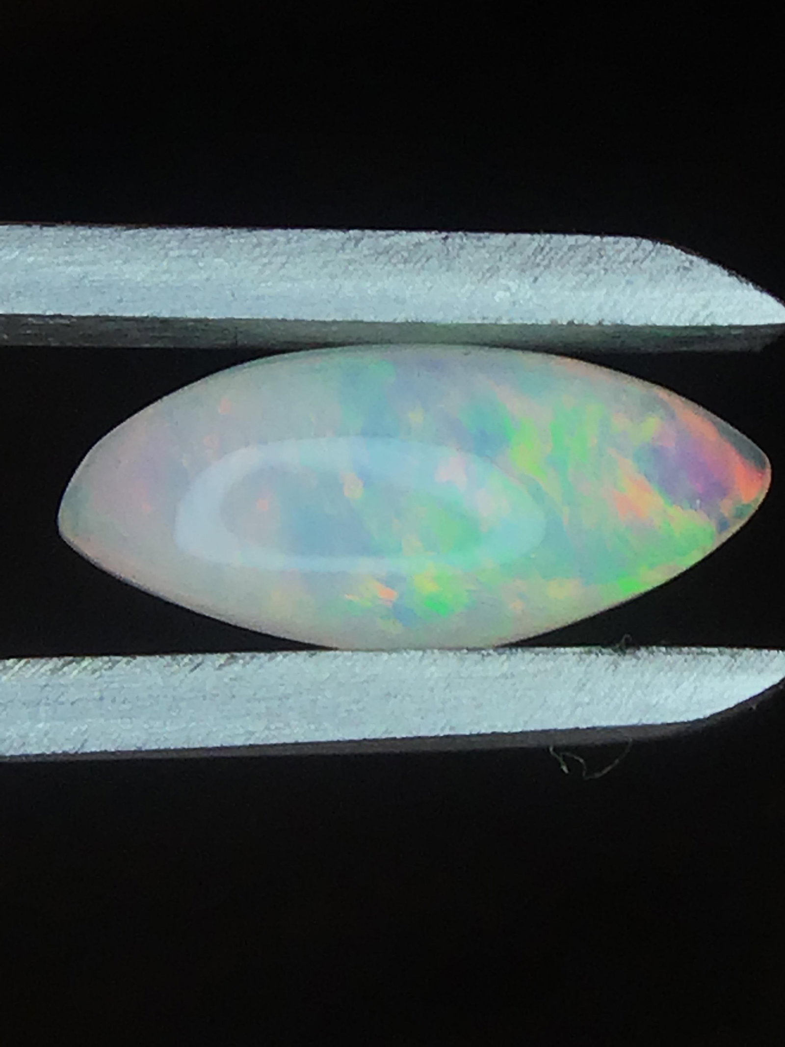 Opal 1.05 ct: Cabochon cut Opal from Ethiopia. 1.05 ct. .21 grams