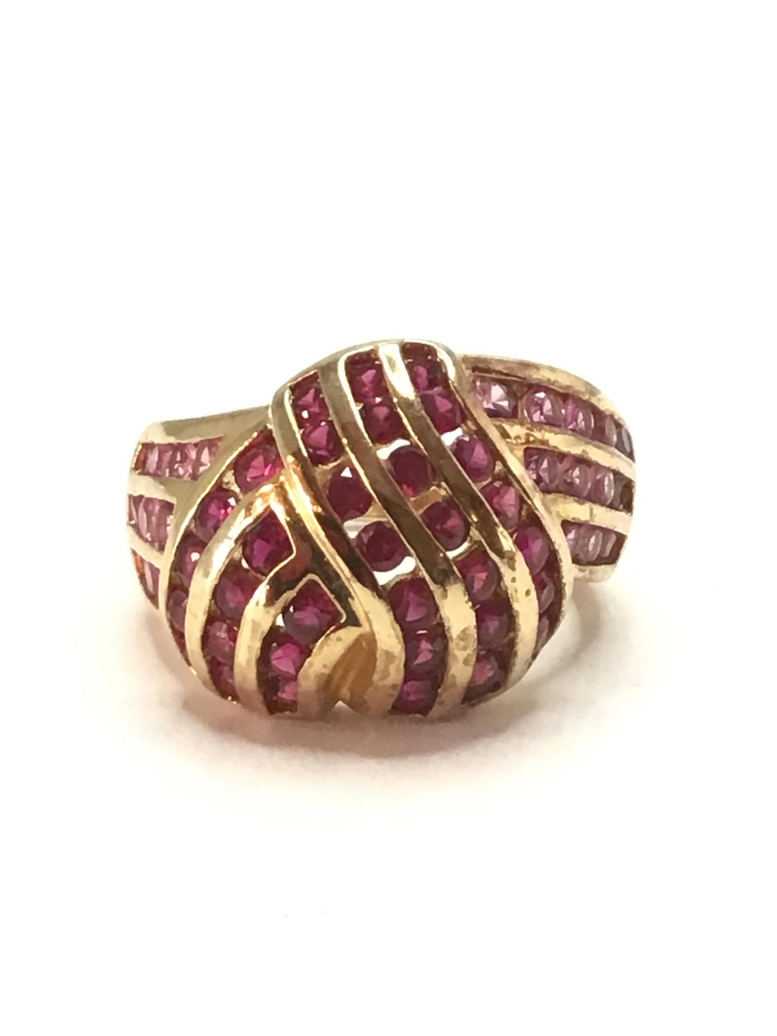 Sterling silver ring: Sterling ring with ruby and sapphire gemstones. 6.77 grams total weight. Size 6 1/4.