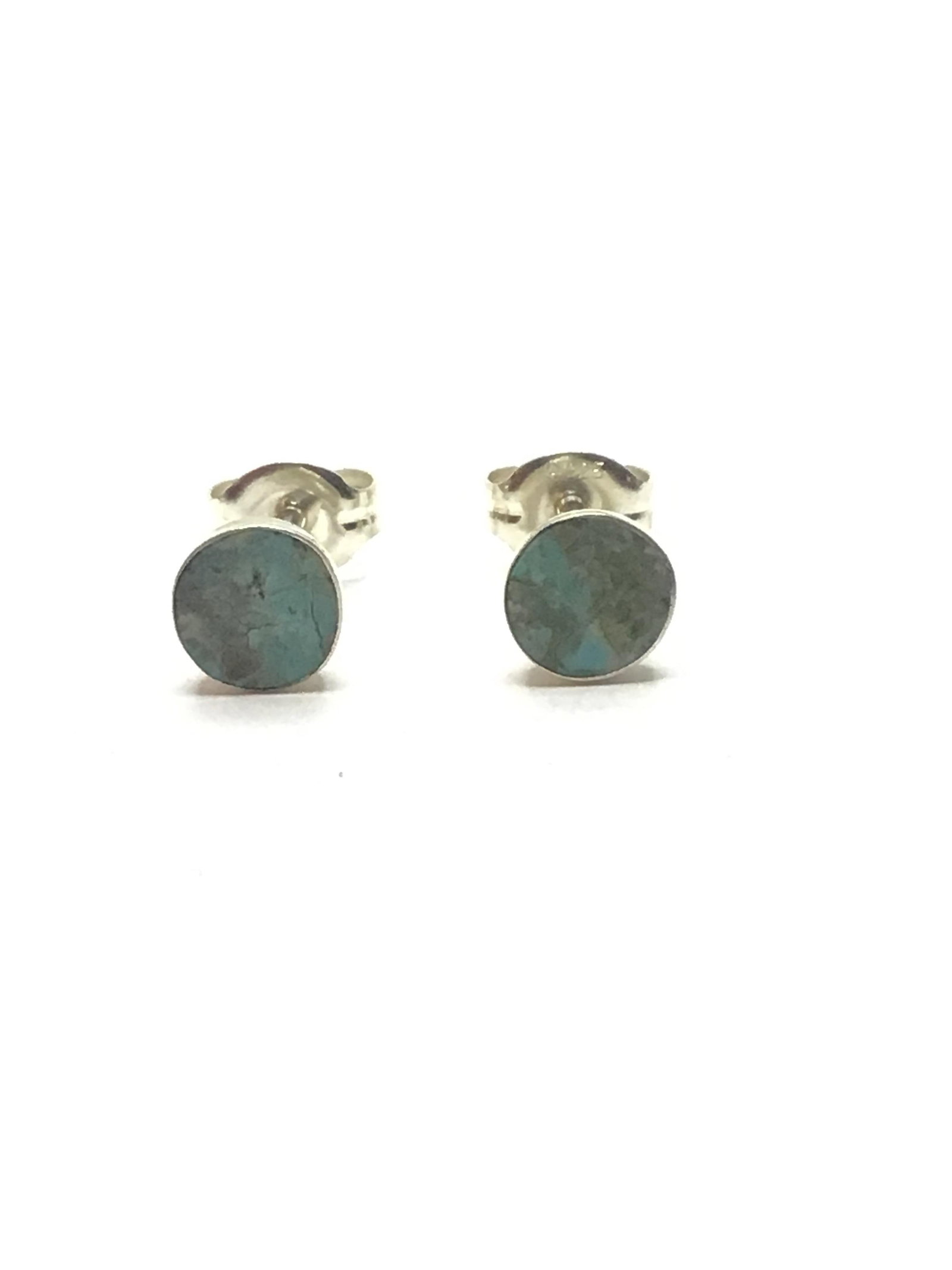 Zuni handmade earrings: Sterling silver stud earrings with turquoise stones. 0.65 grams total weight. Made by Rebecca Davis.