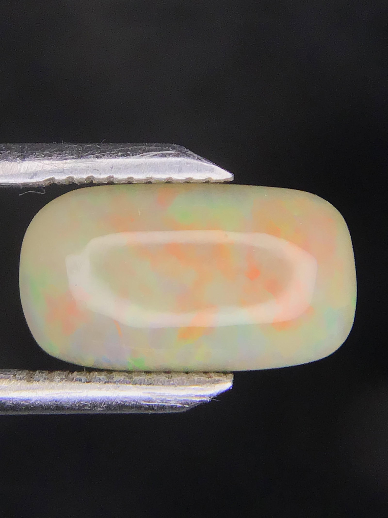 Opal gemstone: Cabochon cut Opal from Ethiopia. 2.35 carats.
