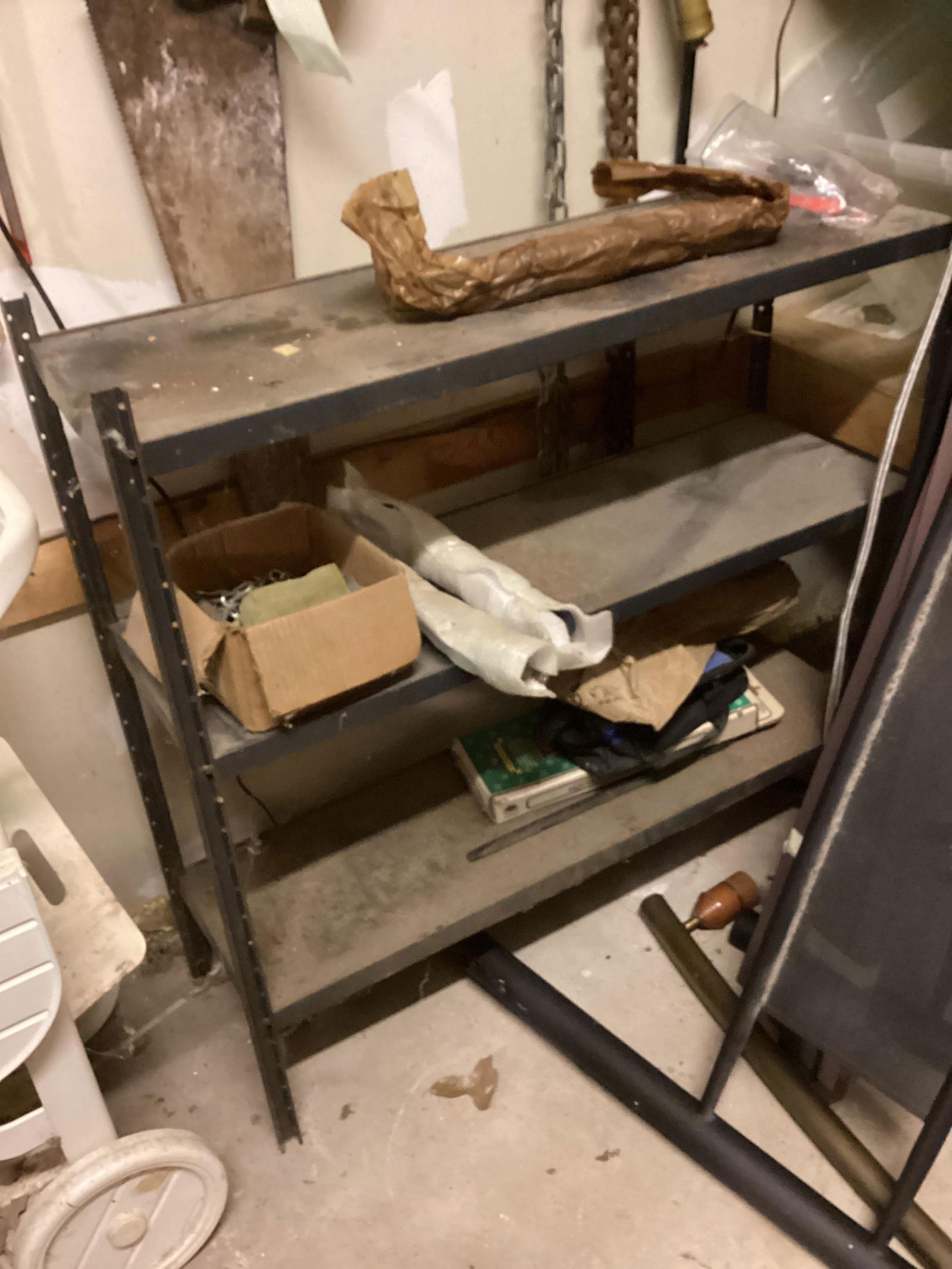 Metal shelving unit with three shelves (1 of 1)