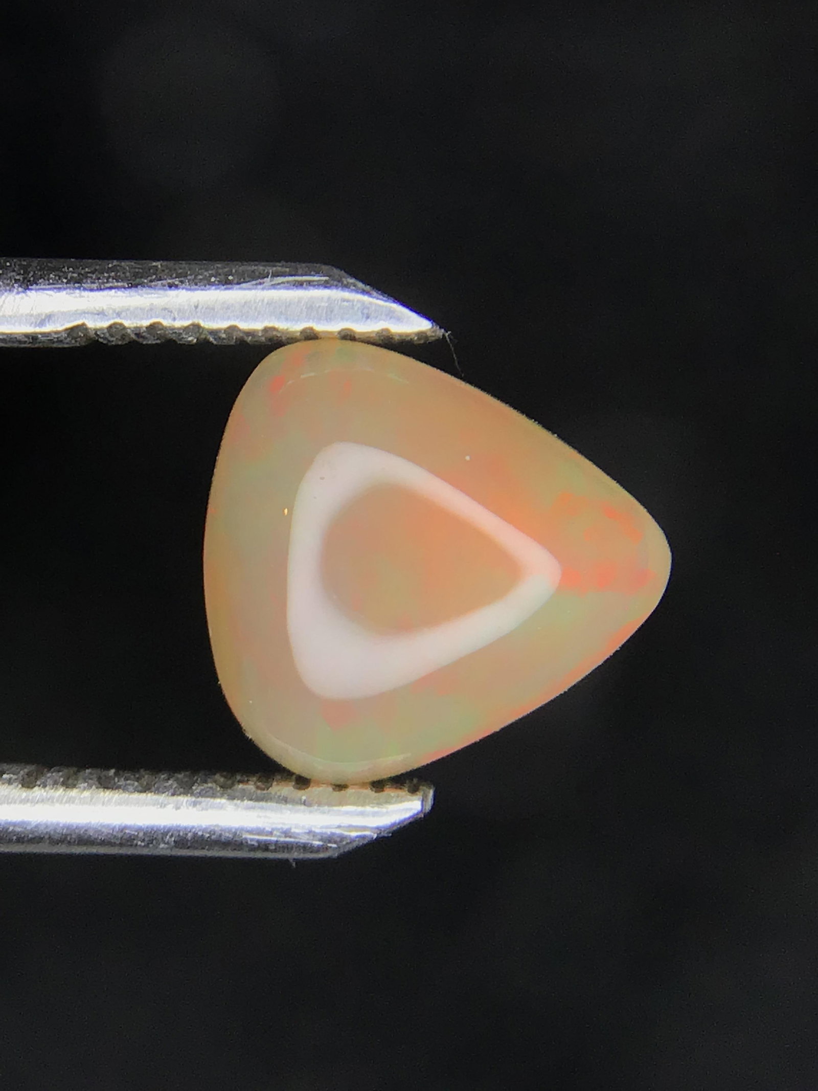 Opal gemstone: Cabochon cut Opal from Ethiopia. 2.05 carats total.