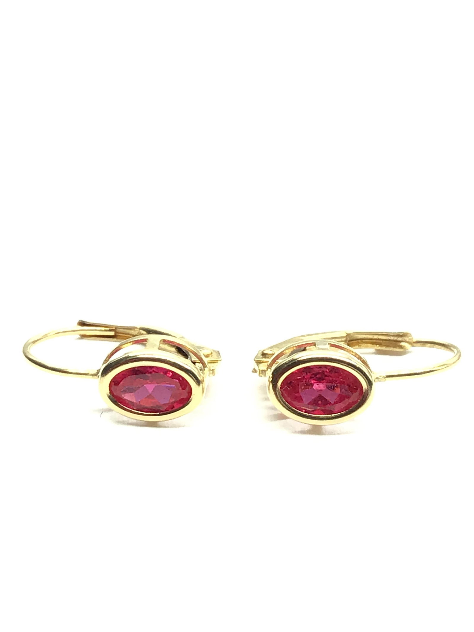14K earrings: 14K yellow gold earrings featuring spinel gemstone. 1.00 grams of total weight. $48