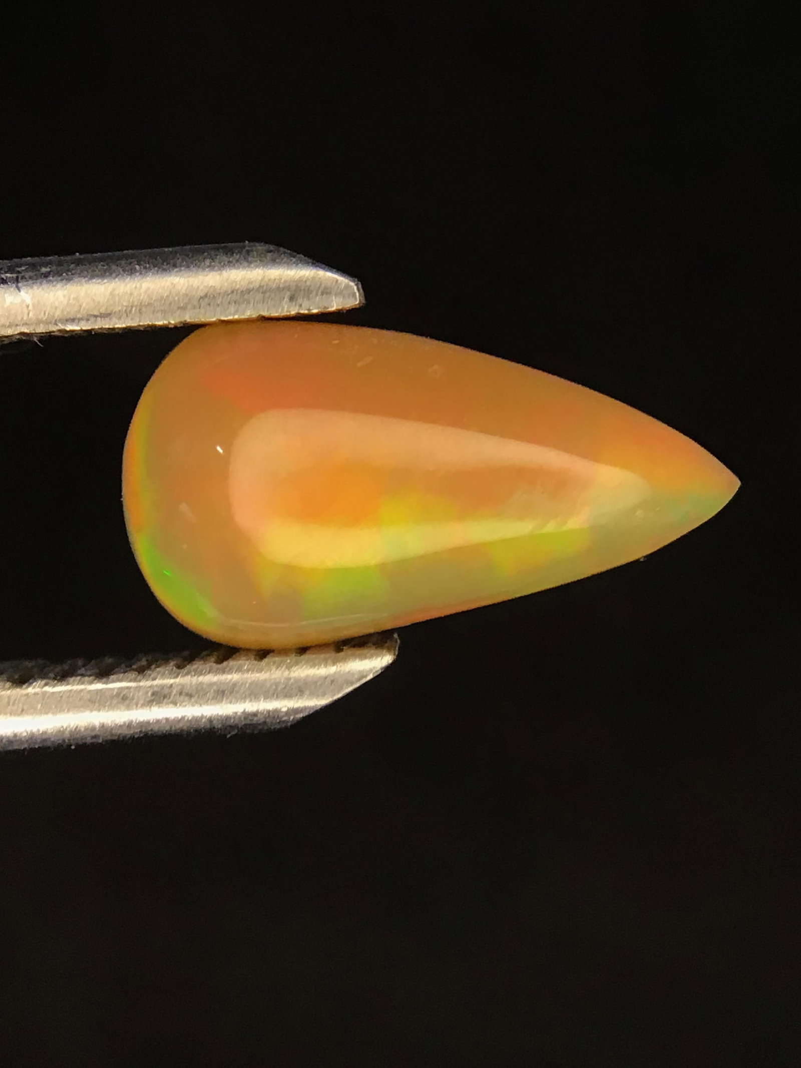 Opal gemstone: Cabachon cut Opal from Ethiopia. 1.65 carats total.