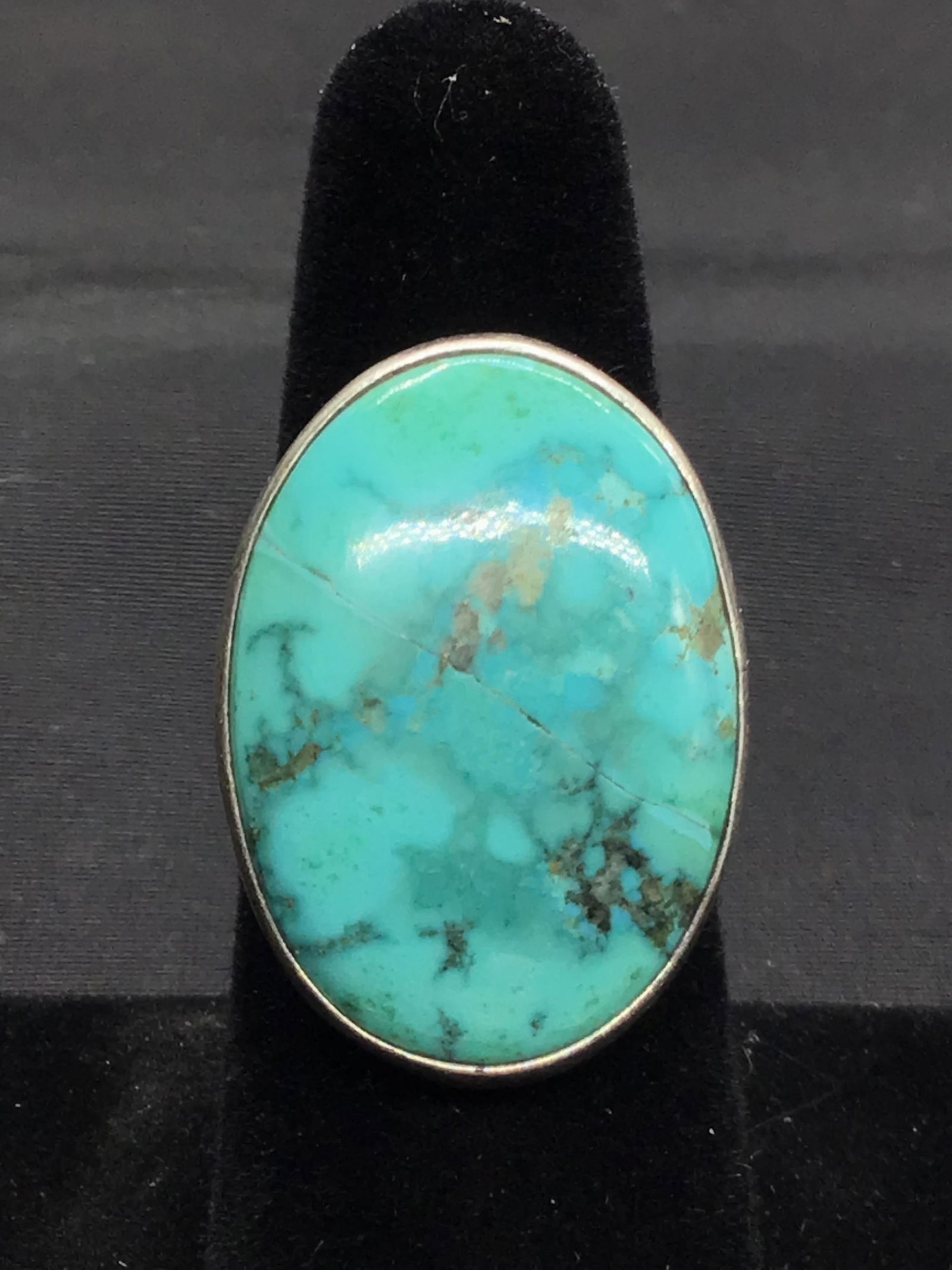 Artisan made ring Sterling silver ring featuring large turquoise stone. 16.63 grams of total weight. (1 of 2)