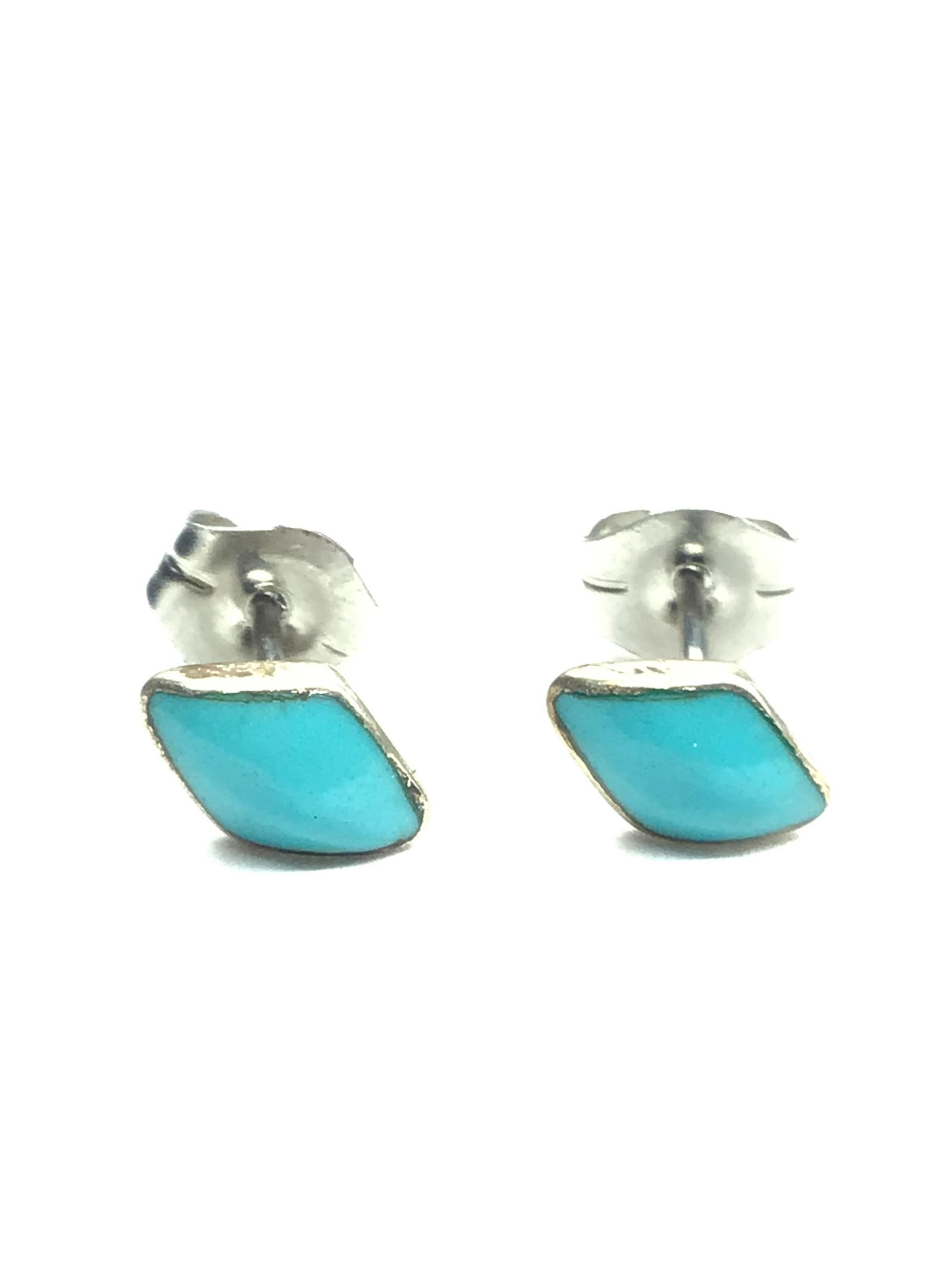 Artisan made earrings Sterling silver stud earrings featuring turquoise stone. 0.49 grams of total (1 of 2)