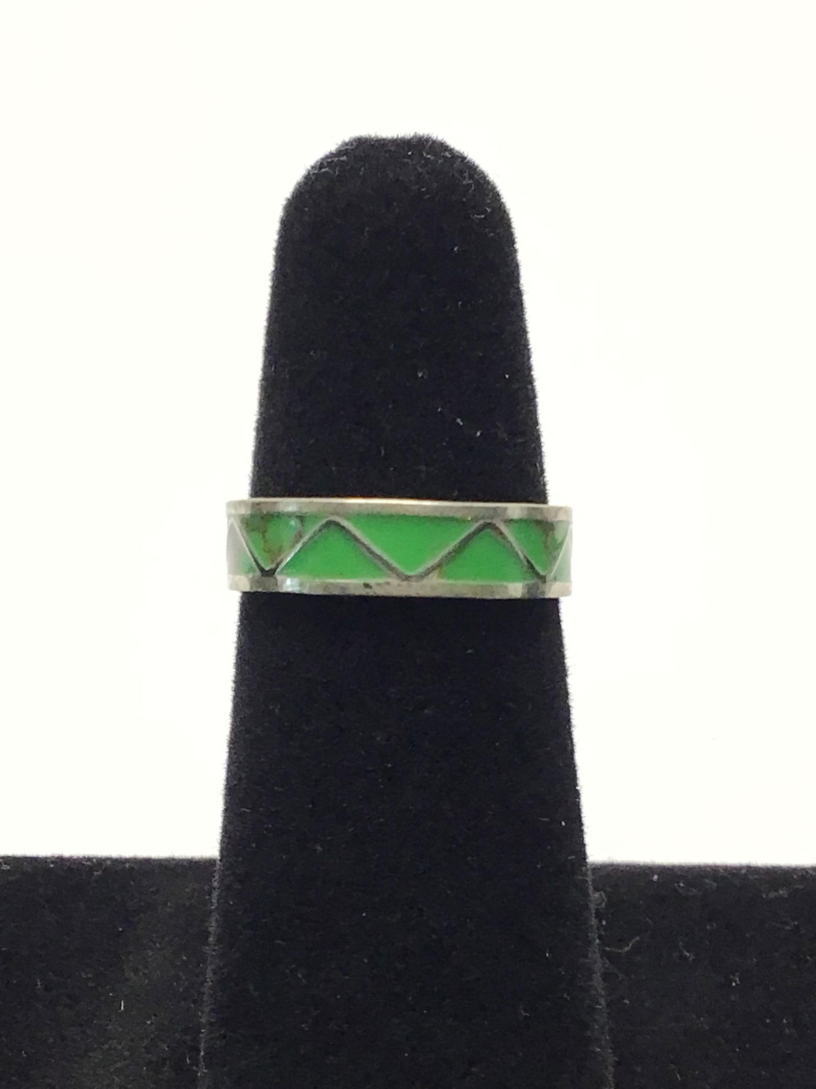 Navajo handmade ring Sterling silver ring with gaspeite inlay. 1.58 grams total weight. Size 8. Made: Sterling silver ring with gaspeite inlay. 1.58 grams total weight. Size 8. Made by Roger Morgan.