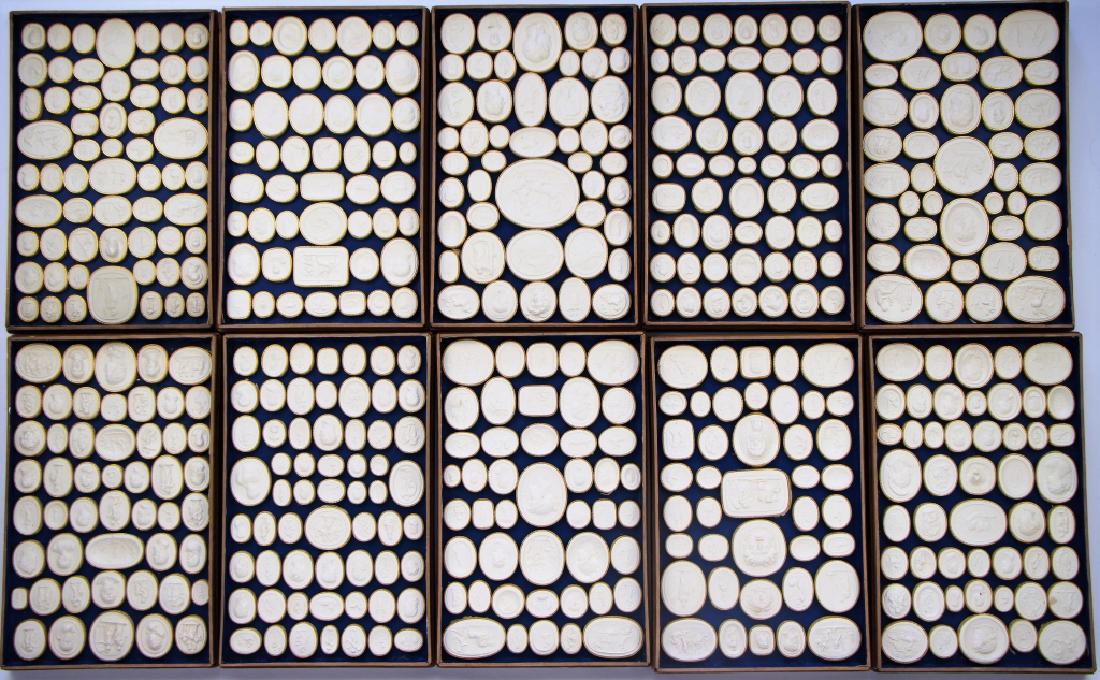 COLLECTION OF 19TH C. GRAND TOUR PLASTER INTAGLIOS: Collection of 500 cameo impressions depicting famous statues and fountains of Rome, layered in 10 wooden fitted stacking trays with each one being numbered to corresponding hand written list. The list