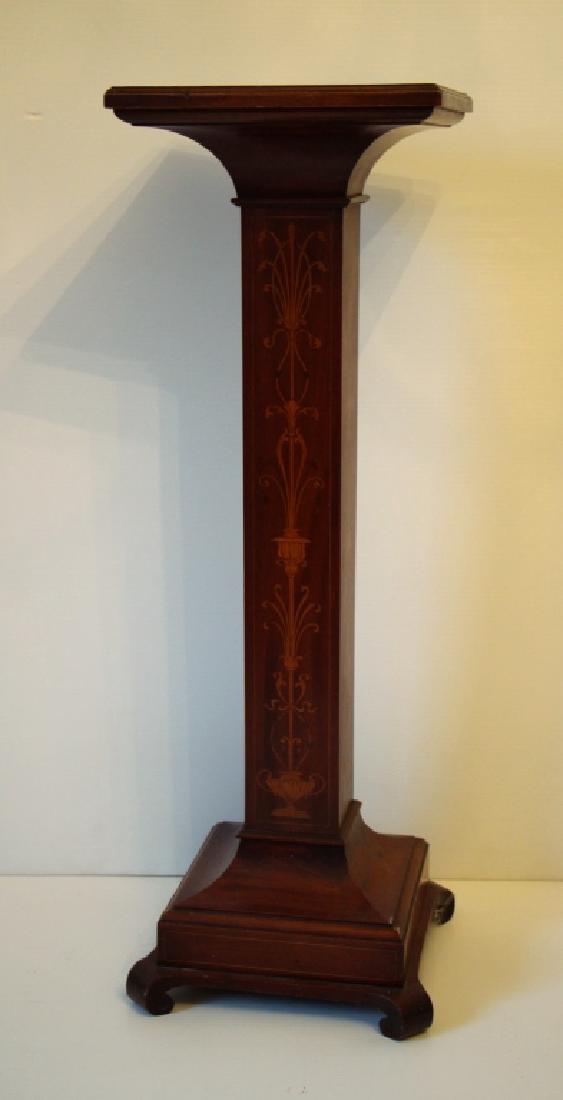 EDWARDIAN MAHOGANY INLAID PEDESTAL: With ornate satin wood marquetry on all four sides, and banded inlay top (some staining). Ht. 36 in. Dia. 12 in.