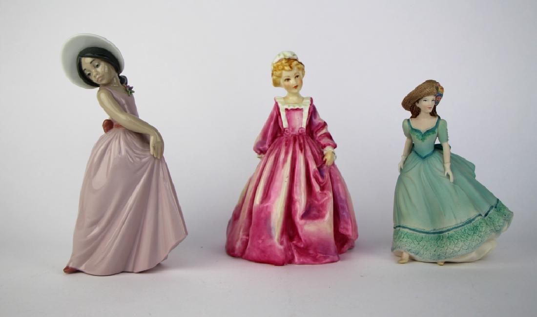THREE PORCELAIN FIGURINES (1 of 5)