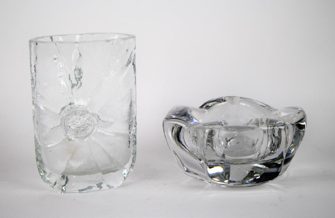 DAUM AND KOSTA BODA ART GLASS: Signed Daum crystal cigar ashtray, and signed Rune Strand Sea Glasbruk sunburst vase. H. of vase 14.5 cm (5 3/4 in.). Total approx. weight 2.3 kg.