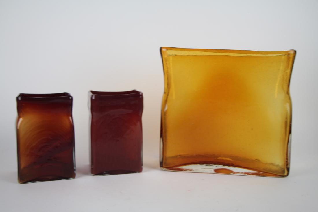 THREE PIECES OF ART GLASS: Large orange block vase and two matching amberina coloured vases, possibly Blenko. H. of tallest 24 cm (9 1/2 in.). Total approx. weight 4.8 kg.