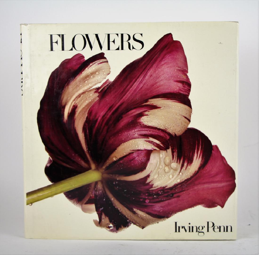 AUTOGRAPHED BOOK BY IRVING PENN (AMER. 1917-2009): With original signature, titled "Flowers". First edition, New York: Harmony Books, 1980. Coloured plates of various flowers. L. 26.5 cm (10 1/2 in.). Total approx. weight 1kg.