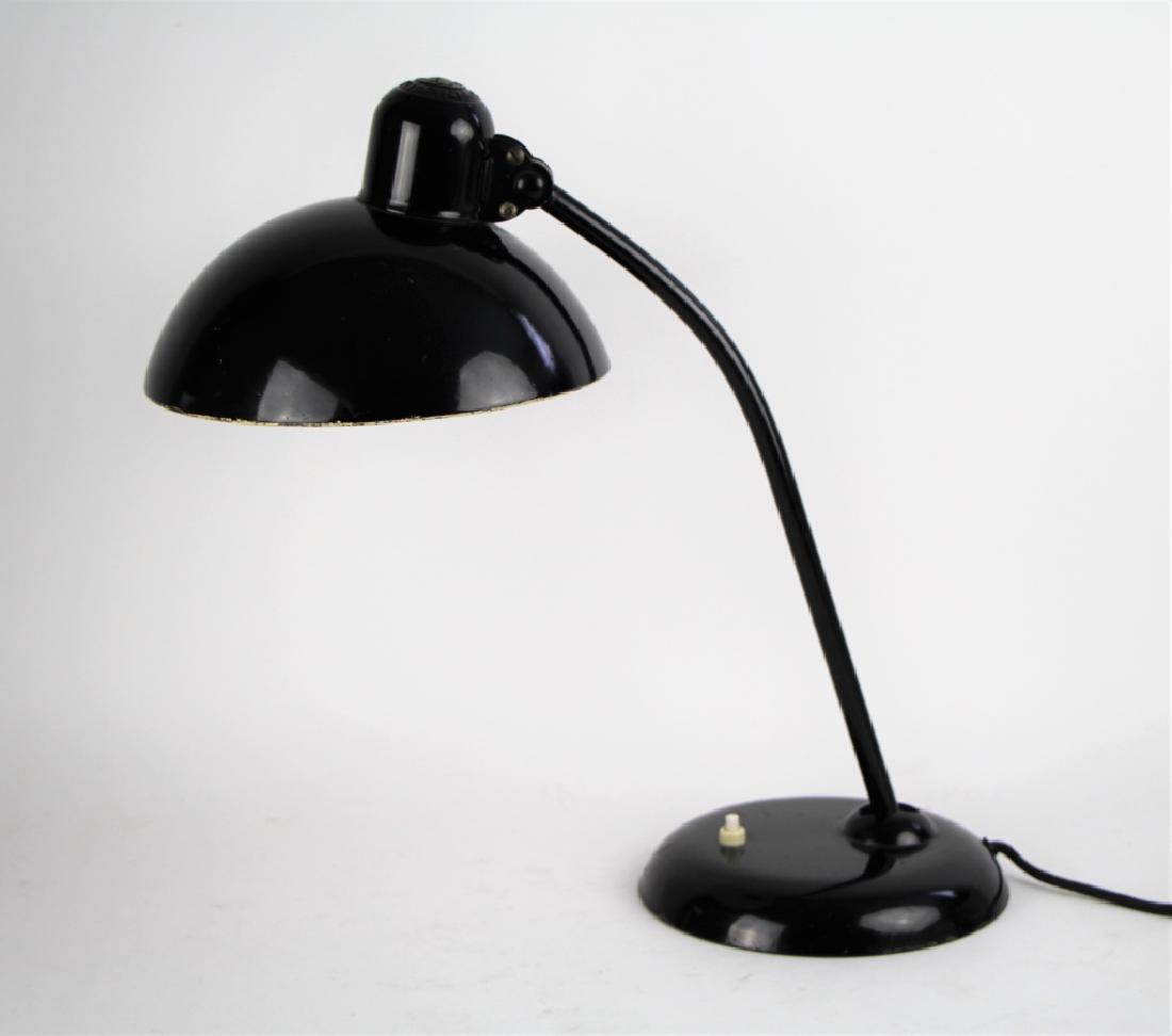 CHRISTIAN DELL FOR KAISER IDELL DESK LAMP: Bauhaus, 1931, in black. Adjustable swivel head and base. Original paint finish with some scratching and wear. H. 40.5 cm (16 in.). Total approx. weight 2.2 kg.