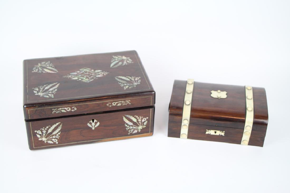 TWO 19TH C DOCUMENT BOXES: One rosewood having ornate abalone marquetry inlay on top and front (no key lock mechanism preventing it from closing). The other having bone strapping and other other decoration; damage to one strap
