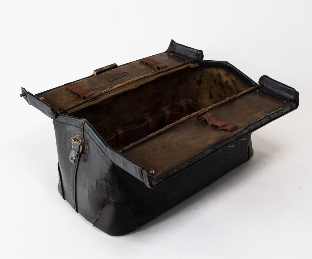 LEATHER DOCTORS BAG: Early American doctors bag, signed Shaw Supply Co. Minor wear. Size: 6"h 16"w 8"d