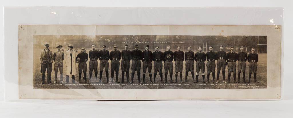 PANORAMIC PHOTO: Nlack and white panoramic photo of 1929 Intercollegiate rugby team. Toronto. Some creases and minor foxing. Unframed. Size: 8" x 28"
