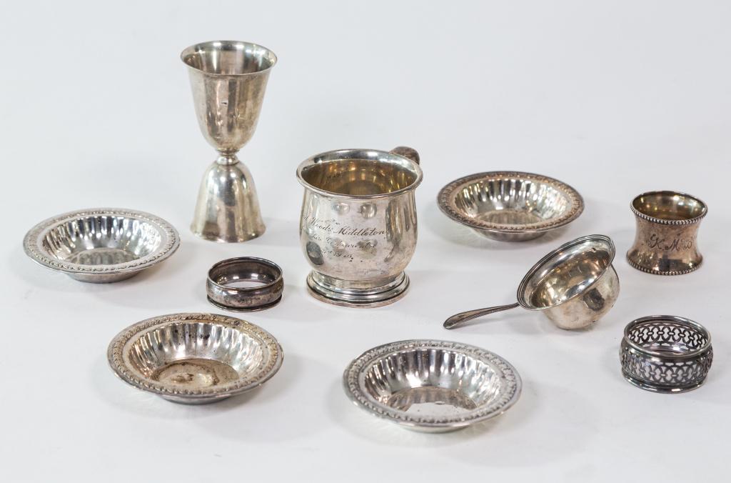 TEN PIECES STERLING SILVER: Including Birks child's mug, juice/egg cup, nut dishes, strainer, etc. Size of largest 4" Total weight 307g