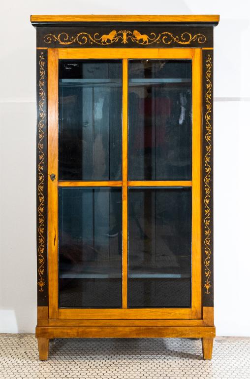 BIEDERMEIER STYLE BOOKCASE: One door bookcase, inlaid with scrolled designs and lions, with adjustable shelves. 20th century. Good condition Size" 69"h 37.5 14d