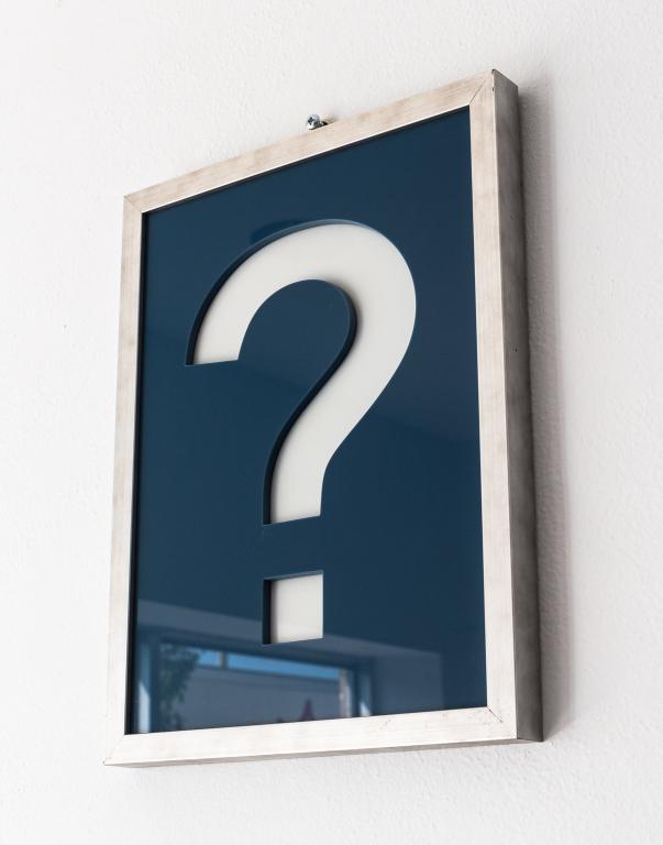 FRAMED VITROLITE PIECE: 2 tiered Waterjet cut and hand polished framed Vitrolite in the form of a question mark. Local artist. Size: 17.5"h 13.5w 1.5d