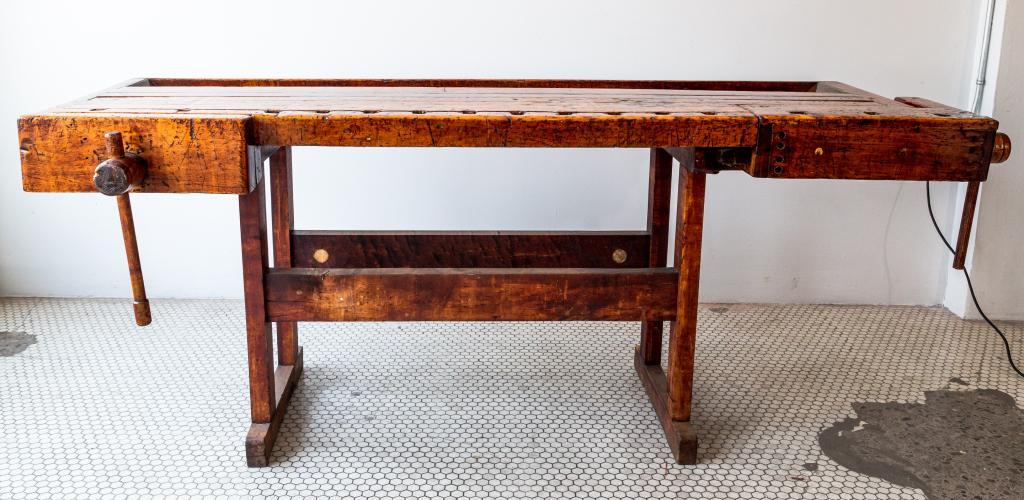 EARLY WORK BENCH: Nice older bench with 2 working vices and a thick high gloss protective finish. Circa 1900. Some imperfections. Size: 33"h 83w 31d