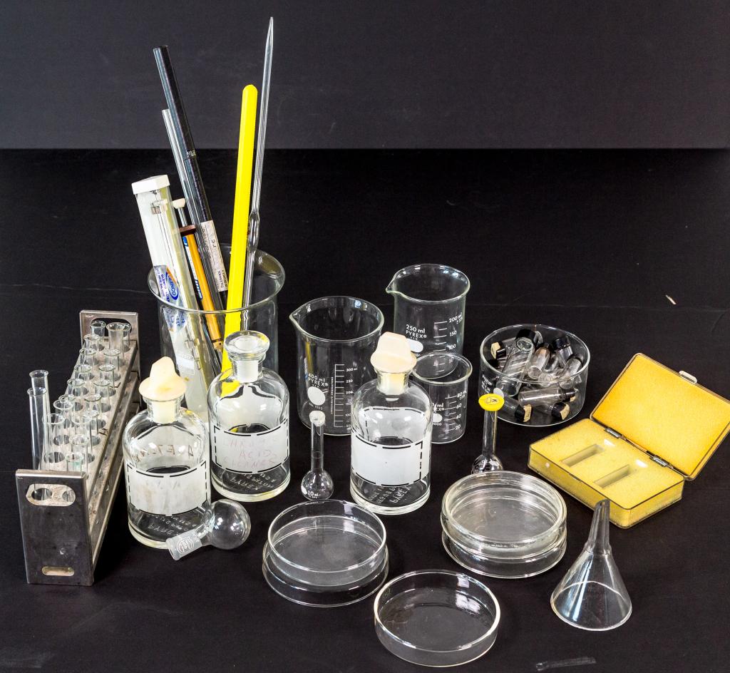 VINTAGE LABORATORY EQUIPMENT: Large lot of Laboratory glass ware. Jars, medicine bottles, dishes, test tubes w/rack, and funnels.