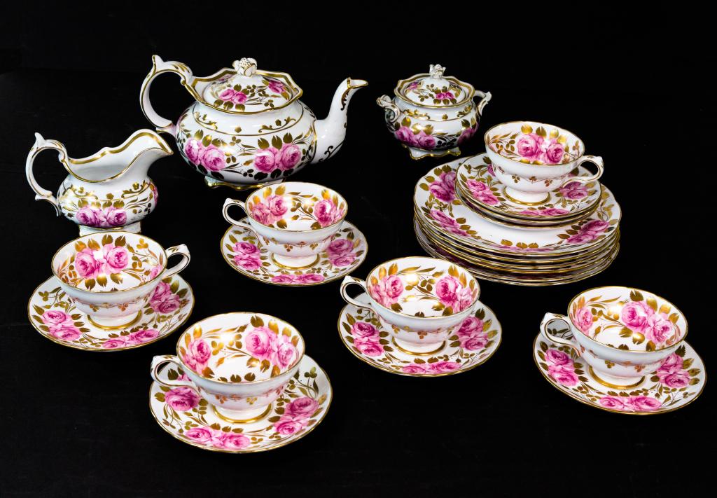 BONE CHINA FLORAL TEA SET: Grosvener bone china tea set with large pink roses and gold decoration. Consisting of teapot, cream and sugar, 6 dessert plates and 6 cups and saucers.
