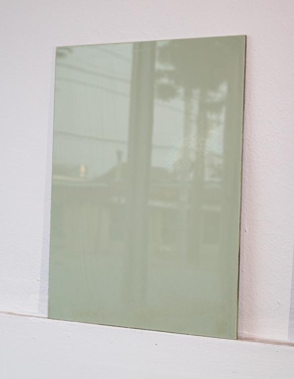FOUR CRATES VINTAGE VITROLITE GLASS: As found. 80-100 Square feet. Soft green Vitrolite glass panels. New old stock. 12' x 16" each