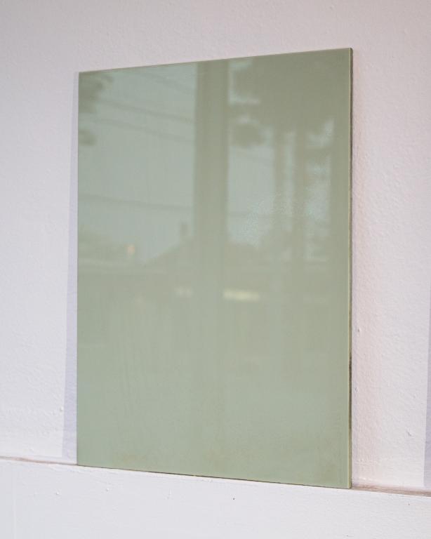 FOUR CRATES VINTAGE VITROLITE GLASS: As found. 80-100 Square feet. Soft green Vitrolite glass panels. New old stock. 12' x 16" each