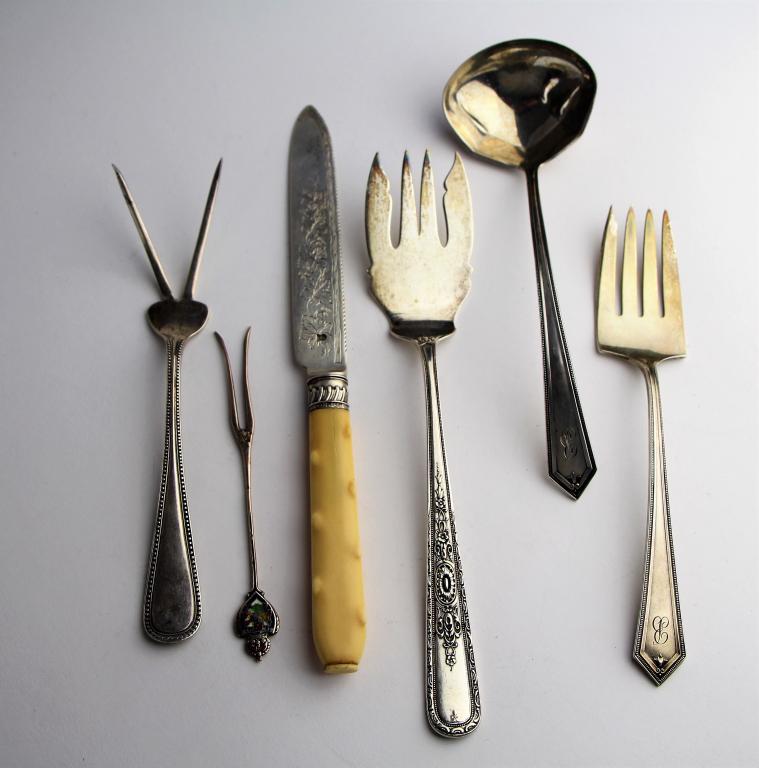 LOT OF SILVER SERVING PIECES: Including serving fork and ladle signed sterling "Alvin", ornate fork dated 1928, 2 prong fork, Bermuda enamel souvenir fork and cake knife with hallmarked Sheffield 1900 blade. Length of longest 23 c