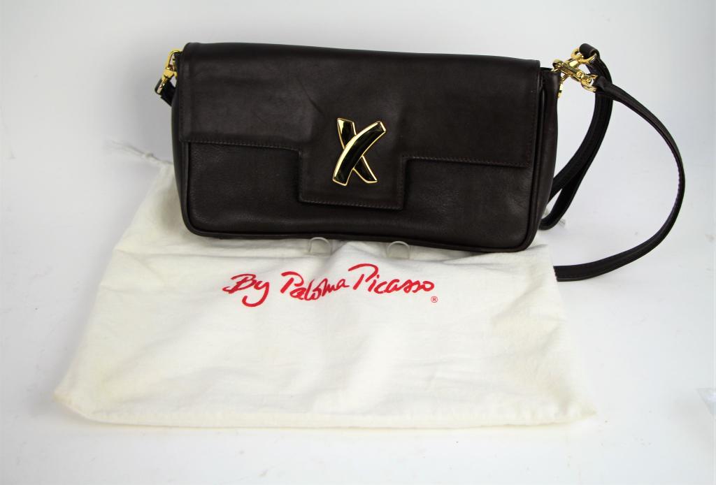 PALOMA PICASSO PURSE: Brown leather purse with original bag in like new condition. Width 30 cm. ( 12 in.) Approx. weight 440 g.