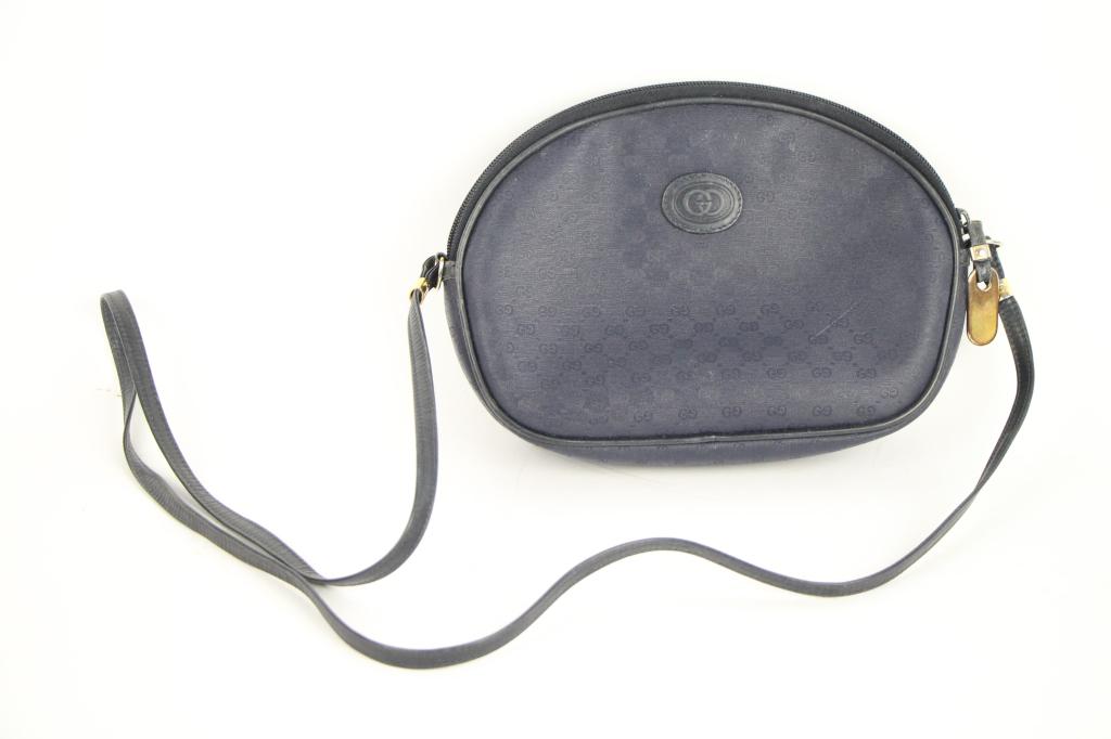 GUCCI PURSE: Blue leather purse. NOTE: This purse came from a good estate which makes me think it could be real, but I cannot guarantee this is a genuine Gucci purse. Please use your own discretion when bidding. I