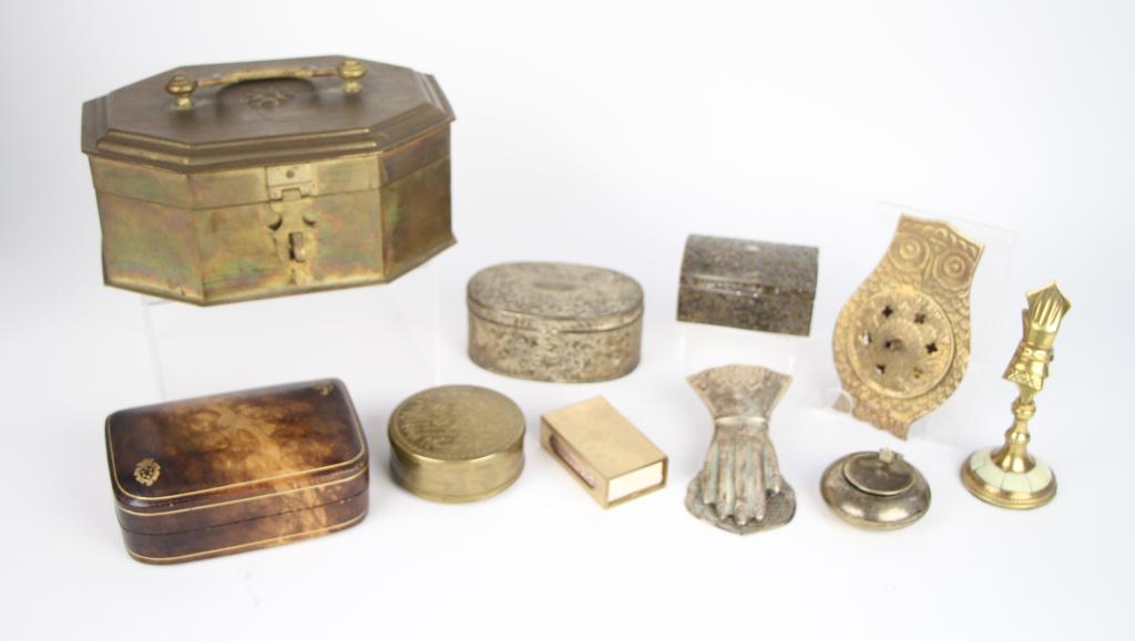 LOT OF BOXES AND METAL WARE: Lot includes an Italian leather box, largeer brass box, Swedish Skultuna snuff box and match holder, portable ashtray, 2 intricate boxes, owl shaped incense holder, and 2 hand shaped bill holders. Mos