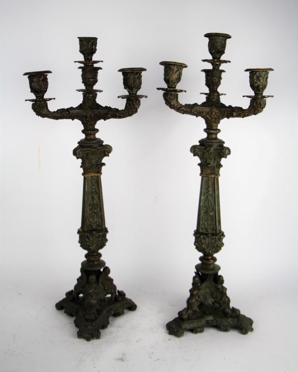 PAIR OF FRENCH CANDELABRA: Speltre with bronze wash. Having figural base in ornate detail. 20th century period. NOTE: Needs tightening, missing bobesh. Selling in as found condition.