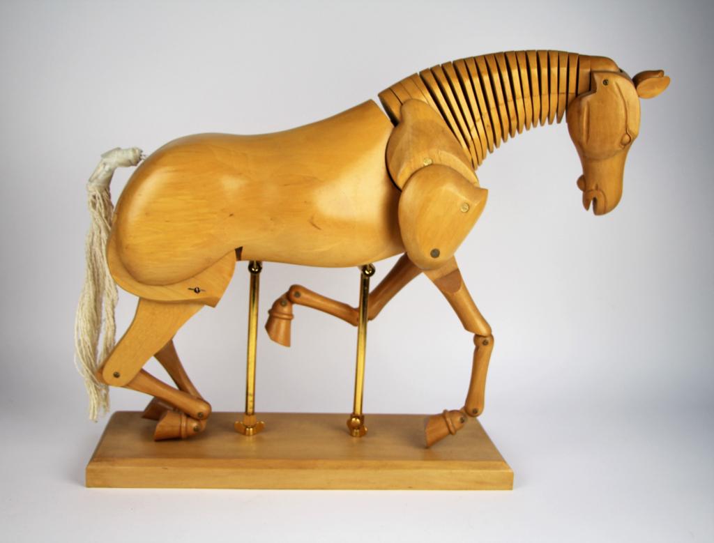 LARGE WOOD ARTICULATED HORSE: Mounted on wood base with 2 metal poles which adjust to raise up horse thus allowing more positions. ( NOTE: missing one brass tightening screw) Legs fully articulated and neck as well. Tail has tape 