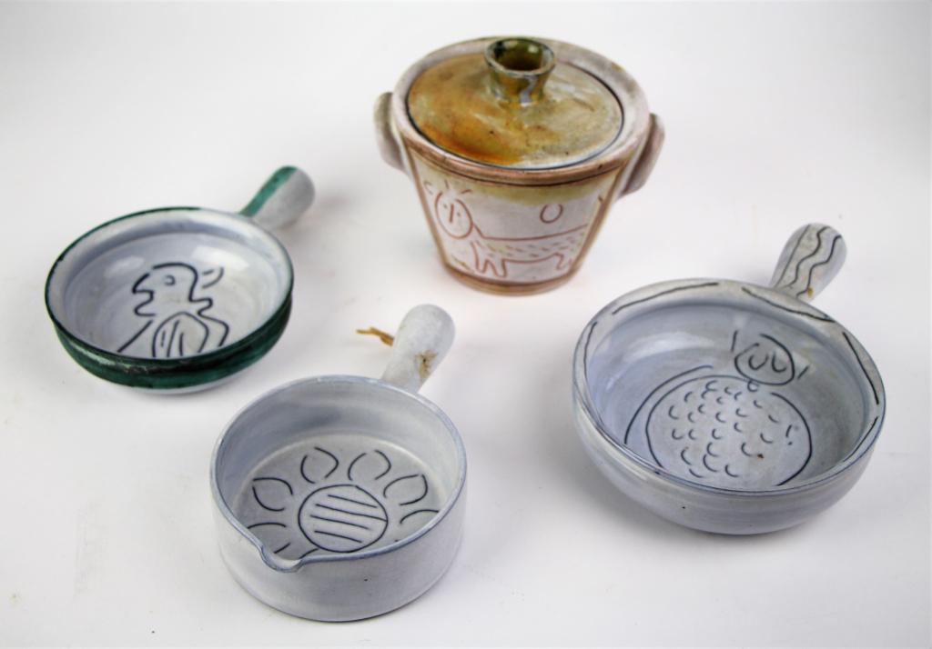 FOUR PIECES OF JACQUES INNOCENTI POTTERY: Jacques Innocenti, Vallauris France studio pottery including 3 handled bowls and covered sugar, with birds, flower, and animal decoration. NOTE: sugar bowl has small hairline at top and lid has 2 chip