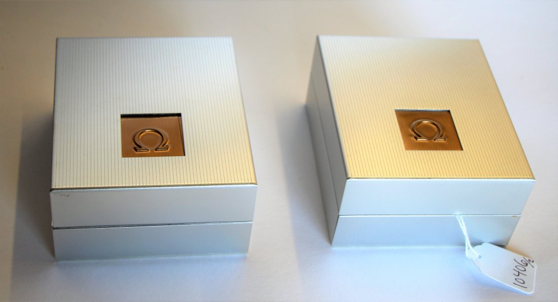 TWO OMEGA SEAMASTER WATCH BOXES: Empty boxes with 2 pamphlets. Length of box 12 cm. ( 4 1/2 in.) Total approx. weight 380 g.
