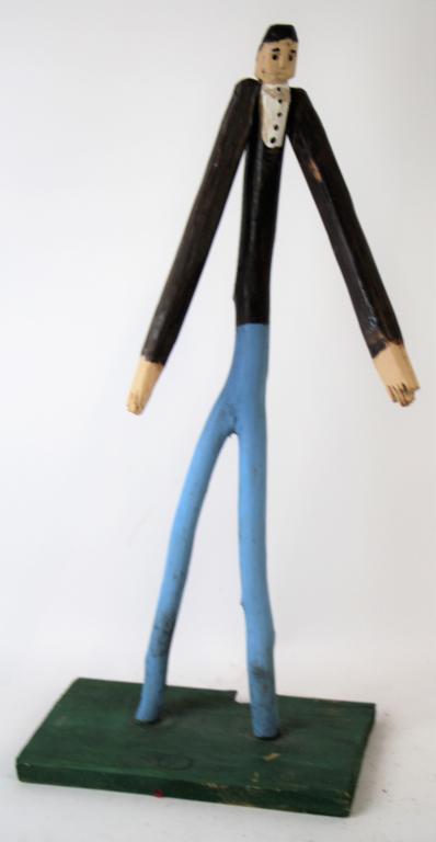 FOLK ART STATUE: Figure of tall thin man, hand painted and carved. Signed "Thomas Rector, Halfway River NS." H: 24 1/2"