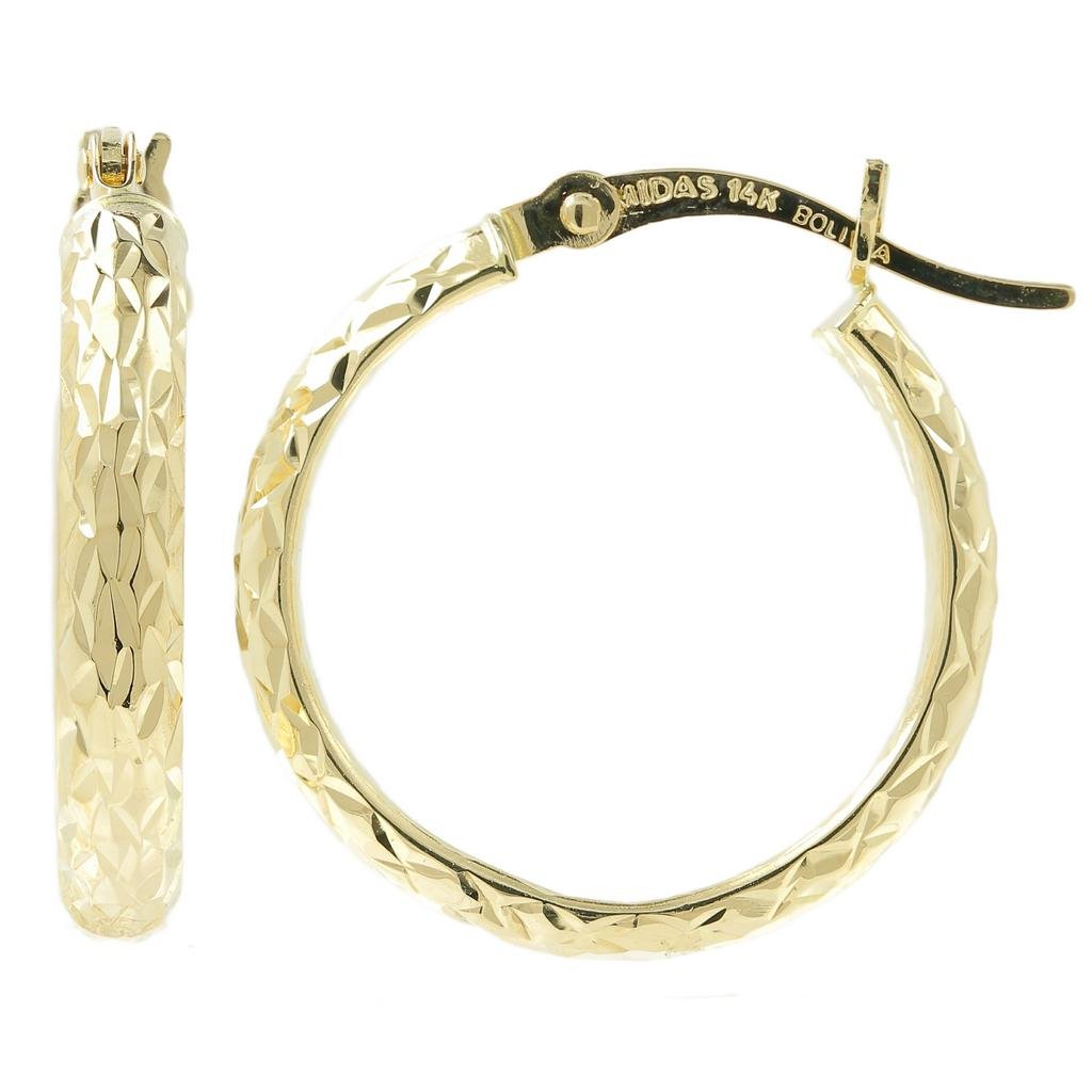 Vintage Classic Estate Ladies 14K Yellow Gold Saddle: Crafted in lustrous solid 14 karat yellow gold these ladies hoop earrings are secured by saddle back closures. A lustrous textured finish accented by carvings adds character and appeal, a classic stat