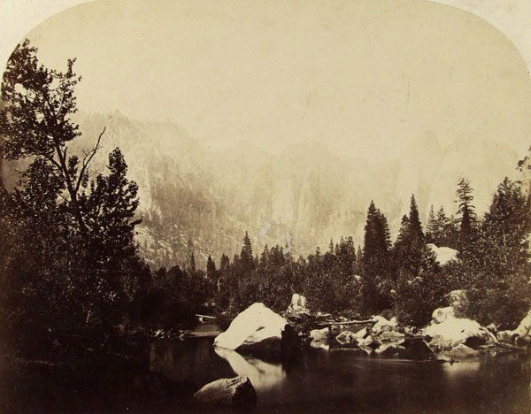 CARLETON E. WATKINS (American) Vintage albumen pr: Carleton E. Watkins (American, 1829 - 1916) Down the Valley. Yo-Semite. Vintage albumen print. 1861. Printed 1860s. Titled and numbered "No. 27" on label affixed to lower right corner of mount. 6 5/16